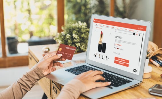 Woman shopping online on internet marketplace browsing for sale items for modern lifestyle and use credit card for online payment from wallet protected by crucial cyber security software