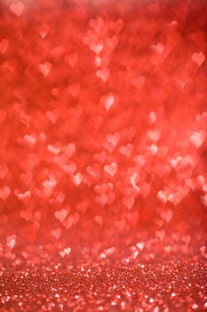 Shiny red heart love bokeh glitter lights abstract background, Valentine's day party celebration concept