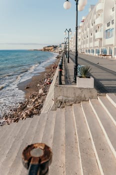 coastal area with apartment buildings of residential areas, modern hotel and restaurant complex on water and sandy beaches