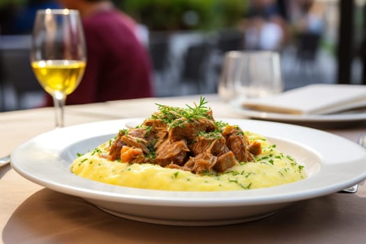 Cassoeula, traditional Lombardy dish with a stew made with pork meat and cabbage, often served with polenta. Italian seasonal comfort dish.