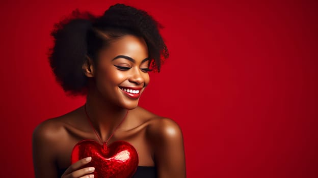 Happy, elegant, laughing, carefree girl African American dark-skinned, woman with heart on red background for Valentine's day, banner, advertisement. Valentine's day, newlyweds, engagement, holiday, birthday, wedding, anniversary, surprise date