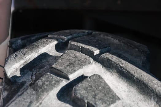 Detail of the interior of an old tractor in an industrial environment.close-up on metal parts in a loader. High quality photo