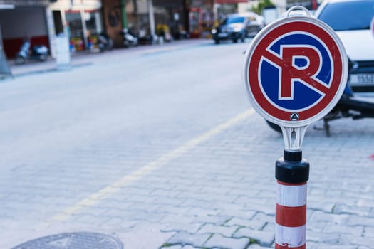 sign on the street parking is prohibited on the left side there is a place for the inscription. High quality photo