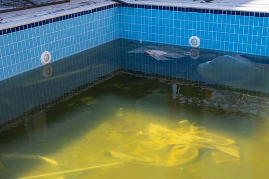 outdoor pool repair,dirty water,outdoor pool cleaning after winter. High quality photo