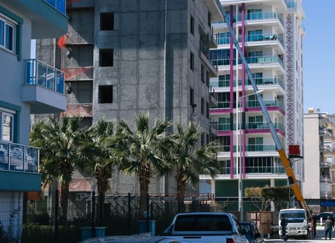 multi-storey building complex. Motion. View of the beautiful design of the facade of a multi-storey residential building.Renovation of the complex. High quality photo