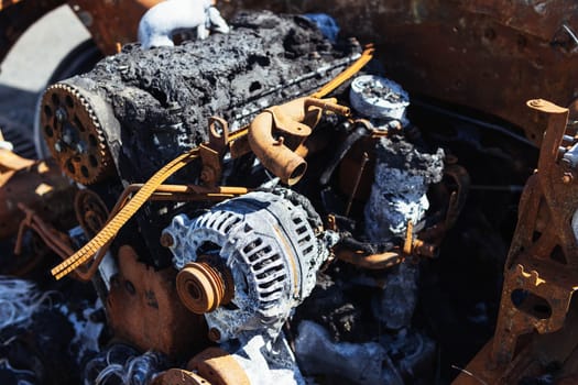 burnt engine in the car close-up. fire insurance concept Burnt car after fire. High quality photo