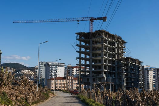 photo of a building that is being built in the city. Photo from bottom to top. High quality photo