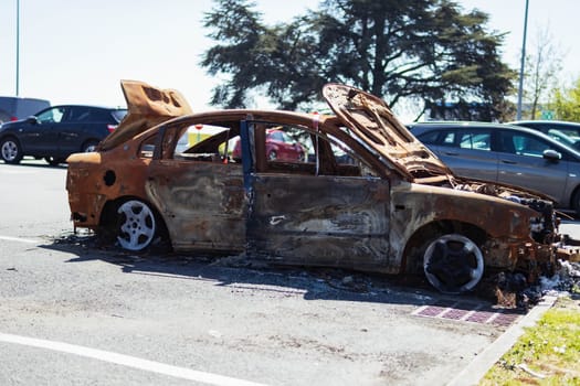 The car after the fire. Iron parts of a burnt car. High quality photo