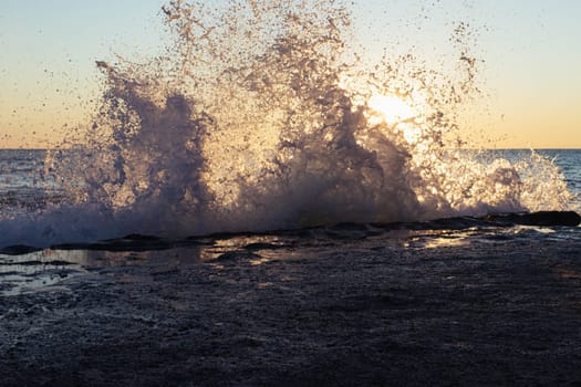 waves on the seashore at sunset, there is a place for an inscription, a beautiful background. High quality photo