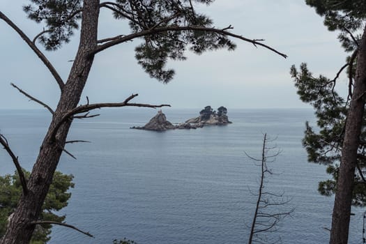 island in the sea Montenegro, the city of Petrovac. Nature and views in Petrovac. High quality photo