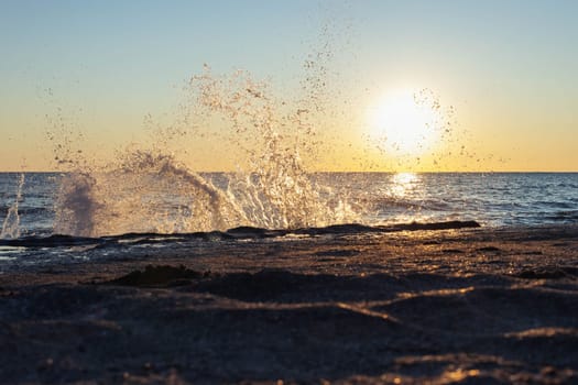 waves on the seashore at sunset, there is a place for an inscription, a beautiful background. High quality photo