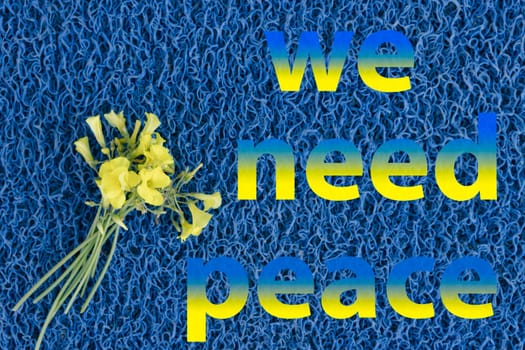 yellow flowers on a blue background, the flag of Ukraine.we need peace inscription High quality photo