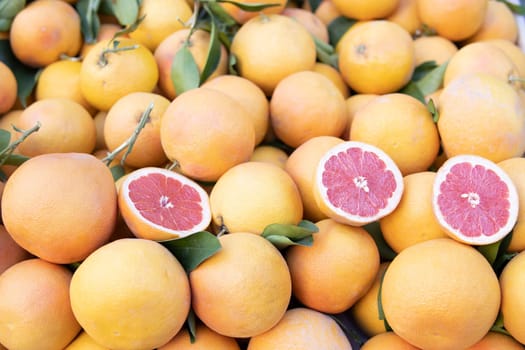 A bunch of fresh grapefruits on the street market, Turkey. background, space for an inscription. High quality photo