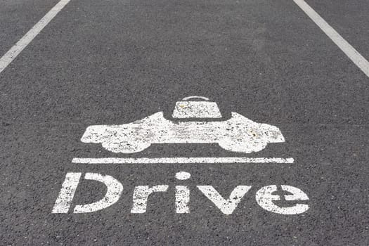 a parking place near the store. A parking place for a car is drawn on the asphalt in white color. Concept. High quality photo