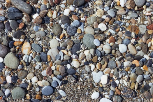 Pebble stone or river stone background with a place for an inscription.beach on the sea close-up. High quality photo