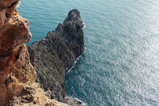 top view of the rock and the sea, a beautiful landscape and background, there is a place for inscriptions. High quality photo