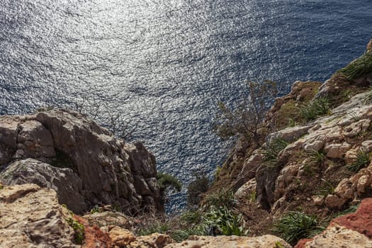 top view of the rock and the sea, a beautiful landscape and background, there is a place for inscriptions. High quality photo