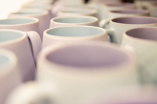 empty cups for coffee or tea close-up on a shelf in a supermarket.Background with cups. High quality photo