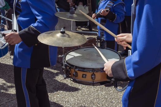 holiday in a European city, musicians play instruments, close-up. High quality photo