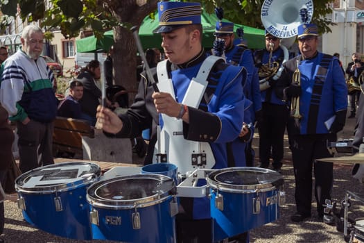 Holiday in the city of France, Les Andelises on October 22, men play drums and various instruments holiday in a European city, musicians play instruments, close-up. High quality photo