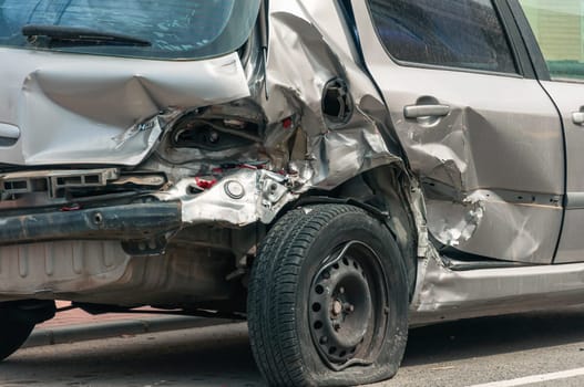 car after an accident, the insurance for the car damaged in the accident.The front bumper of the car all damaged after the accident. High quality photo