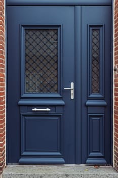 blue color front door isolated ,close-up .Beautiful blue color front door. High quality photo