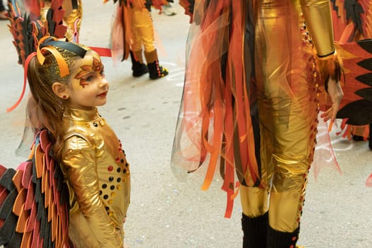 Carnival in Spain, the city of Torrevieja, February 12, 2023, people walk at the carnival. High quality photo