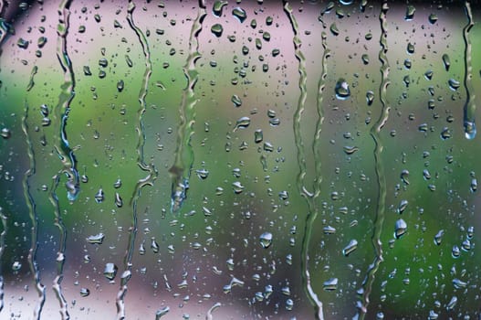 Rain drops on green background.there is a place for an inscription High quality photo