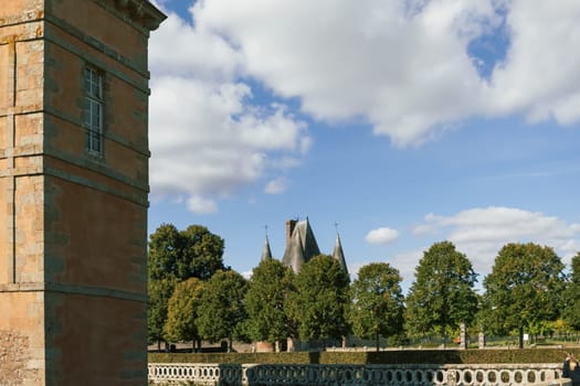 summer landscape of nature against the background of blue sky and green grass and trees chateau, there is a place for an inscription. High quality photo