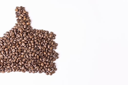 coffee grains. On a white background, a hand is drawn from coffee, there is a place for an inscription on the right. The hand shows the class