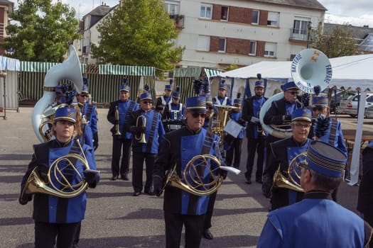 Holiday in the city of France, Les Andelises on October 22, men play drums and various instruments holiday in a European city, musicians play instruments, close-up. High quality photo