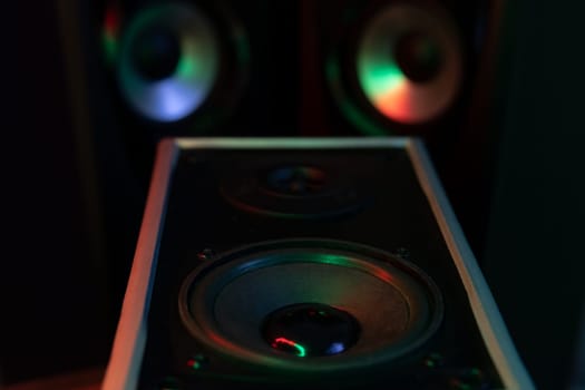 powerful sound speakers in colorful neon light.Powerful music. High quality photo