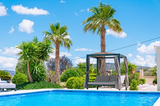 landscape swimming pool blue sky with clouds. Tropical beautiful hotel. High quality photo