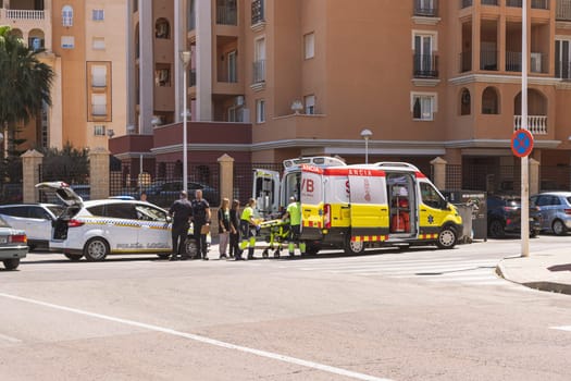 Accident in Spain, Torrevieja May 28, 2023, police car and ambulance on the road. High quality photo