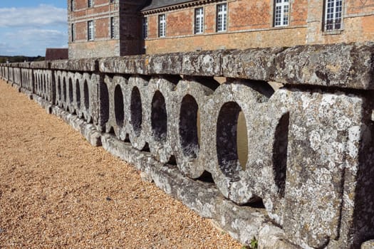 Antique cement fence close-up in the chateau, there is a place for an inscription. High quality photo