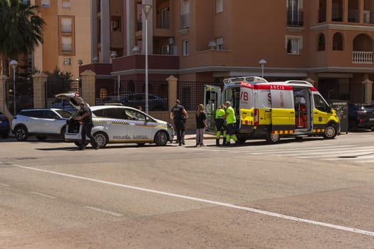 Accident in Spain, Torrevieja May 28, 2023, police car and ambulance on the road. High quality photo