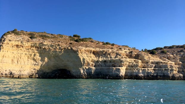 Summer Atlantic ocean rocky coastline near Carvoeiro town, Lagoa, Algarve - Portugal.