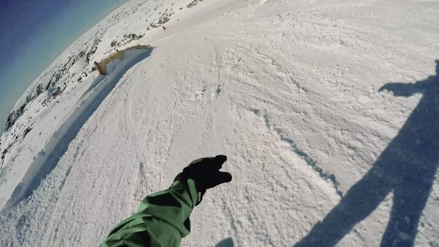 Snowboard freerider in the mountains.