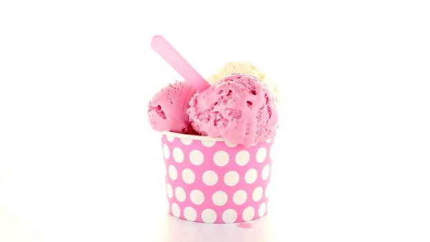 Ice cream scoop in paper cup on white background.