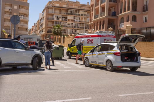 Accident in Spain, Torrevieja May 28, 2023, police car and ambulance on the road. High quality photo