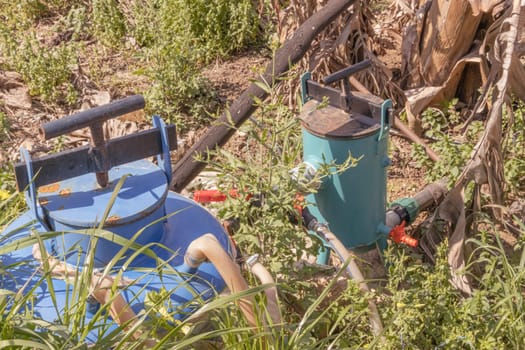 pump for water on a banana plantation to water the crop in the heat High quality photo