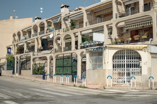 Many bright houses close-up in a resort town in Spain. High quality photo