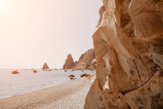 Aerial panoramic view of beautiful sunset above sea. Beautiful seascape. Sun glare, small waves on the water surface. Evening. Horizon. Nobody. No people. Copy space. Never-ending beauty of nature