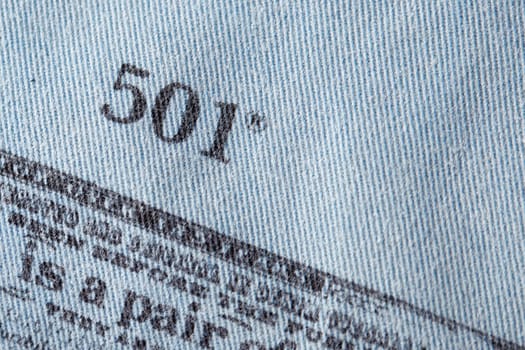 Close up of the details of new LEVI'S 501 Jeans on the inside. label and stamp LEVI'S. Classic jeans model Levi Strauss on the underside of the textile. 31.12.2021, Rostov, Russia.