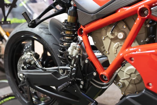 A close up of a motorcycle parked in a garage