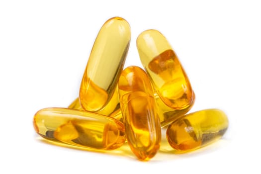 Close up of food supplement oil filled capsules suitable for: fish oil omega 3 omega 6 omega 9
