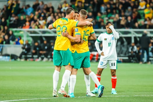 MELBOURNE, AUSTRALIA - NOVEMBER 16: Mitchell Duke of Australia celebrates scoring with teammates during the 2026 FIFA World Cup Qualifier match between Australia Socceroos and Bangladesh at AAMI Park on November 16, 2023 in Melbourne, Australia
