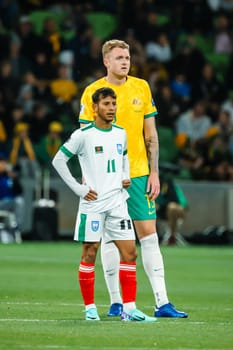 MELBOURNE, AUSTRALIA - NOVEMBER 16: Harry Souttar of Australia and Foysal Fahim of Bangladesh during the 2026 FIFA World Cup Qualifier match between Australia Socceroos and Bangladesh at AAMI Park on November 16, 2023 in Melbourne, Australia