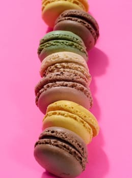 Assortment of colorful macarons, top view