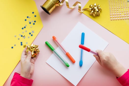 Winter holidays background. Gift wrapping and decorating christmas present, boxes in craft paper with satin silver ribbon.